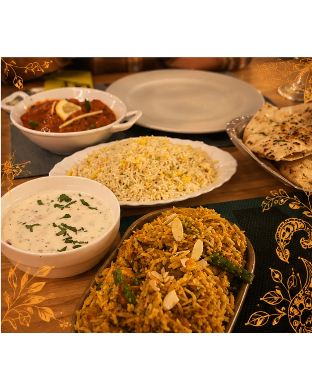 Mesa en Royal king indian cuisine Barcelona con Royal Special Biryani, arroz basmati, curry y naan de cocina india auténtica